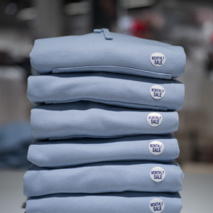 Sweaters with apparel size stickers