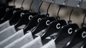 T-shirts on hanger with plastic sizers