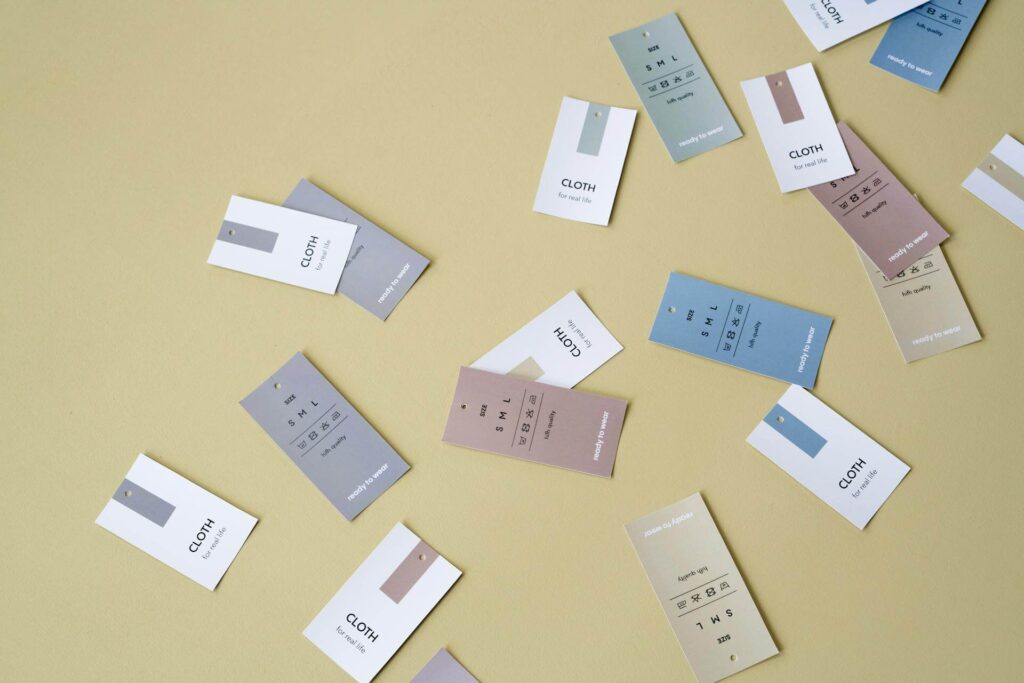 Customizable size strip labels for retail clothing organization by Mark Bric Sizers.